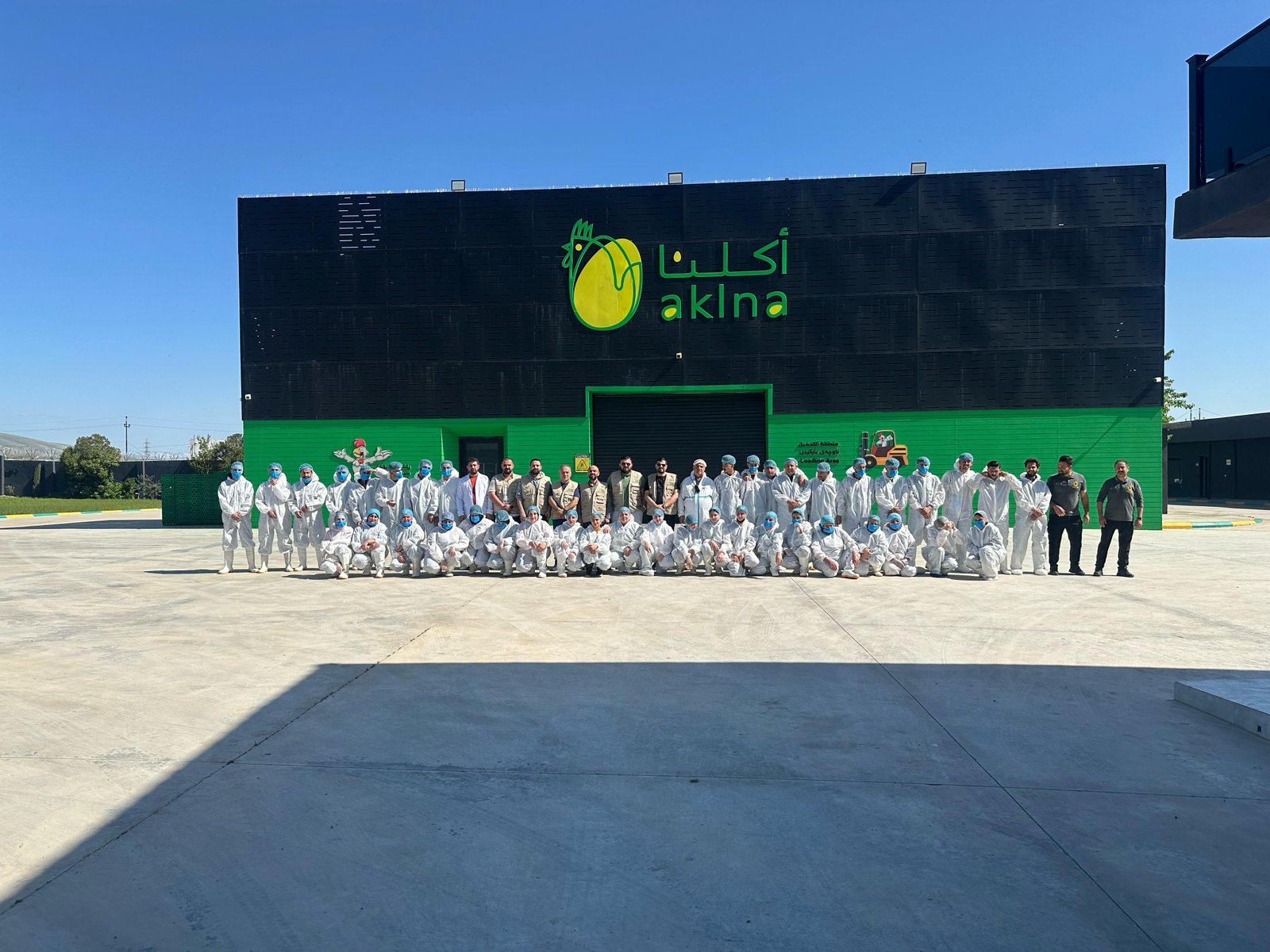 Team in front of the Aklna facility